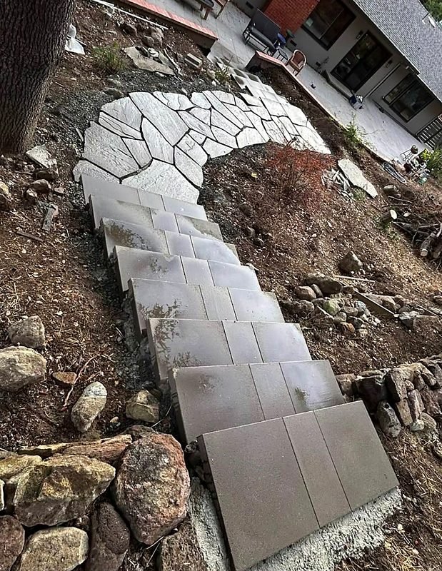 Flagstone path and paver steps on a hillside