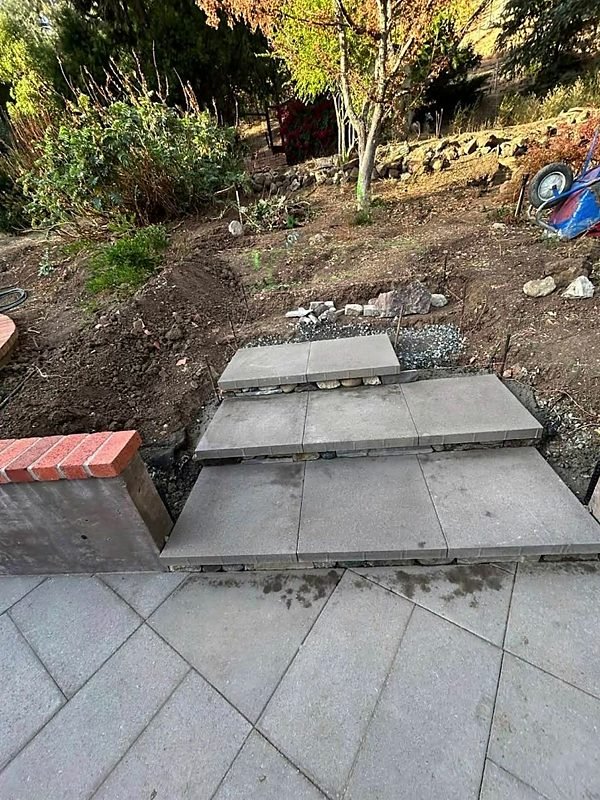 Paver steps up a planted slope