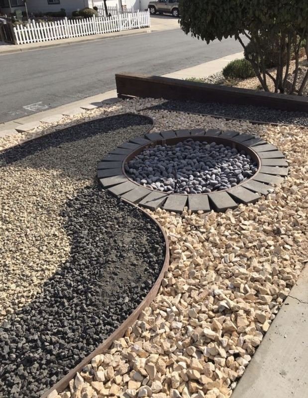 Round paver fire pit ring with lava rock
